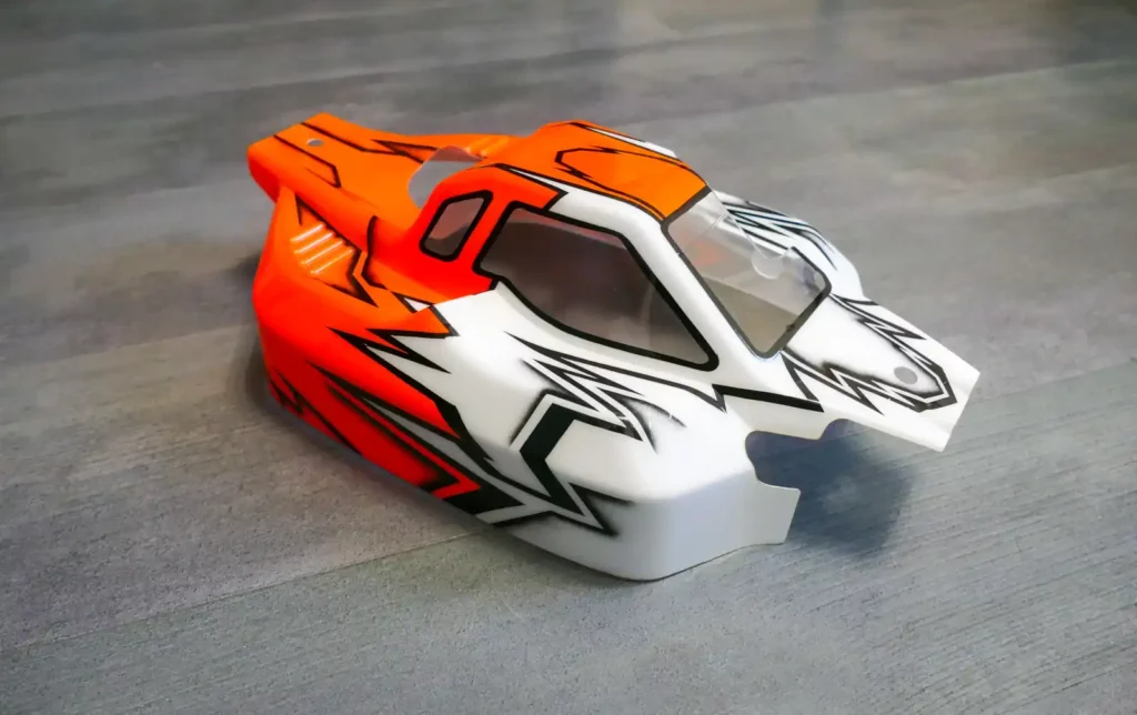 Carrosserie pour voiture radiocommandée mugen mbx8r thermique et électrique. Chromatikrc réalise des peintures de carrosserie sur-mesure. Peinture à l'aérographe sur carrosserie mugen.